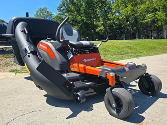 compare product Husqvarna Z254F Special Edition Zero Turn Mower 23HP KAW with 591111401 Triple Bagger